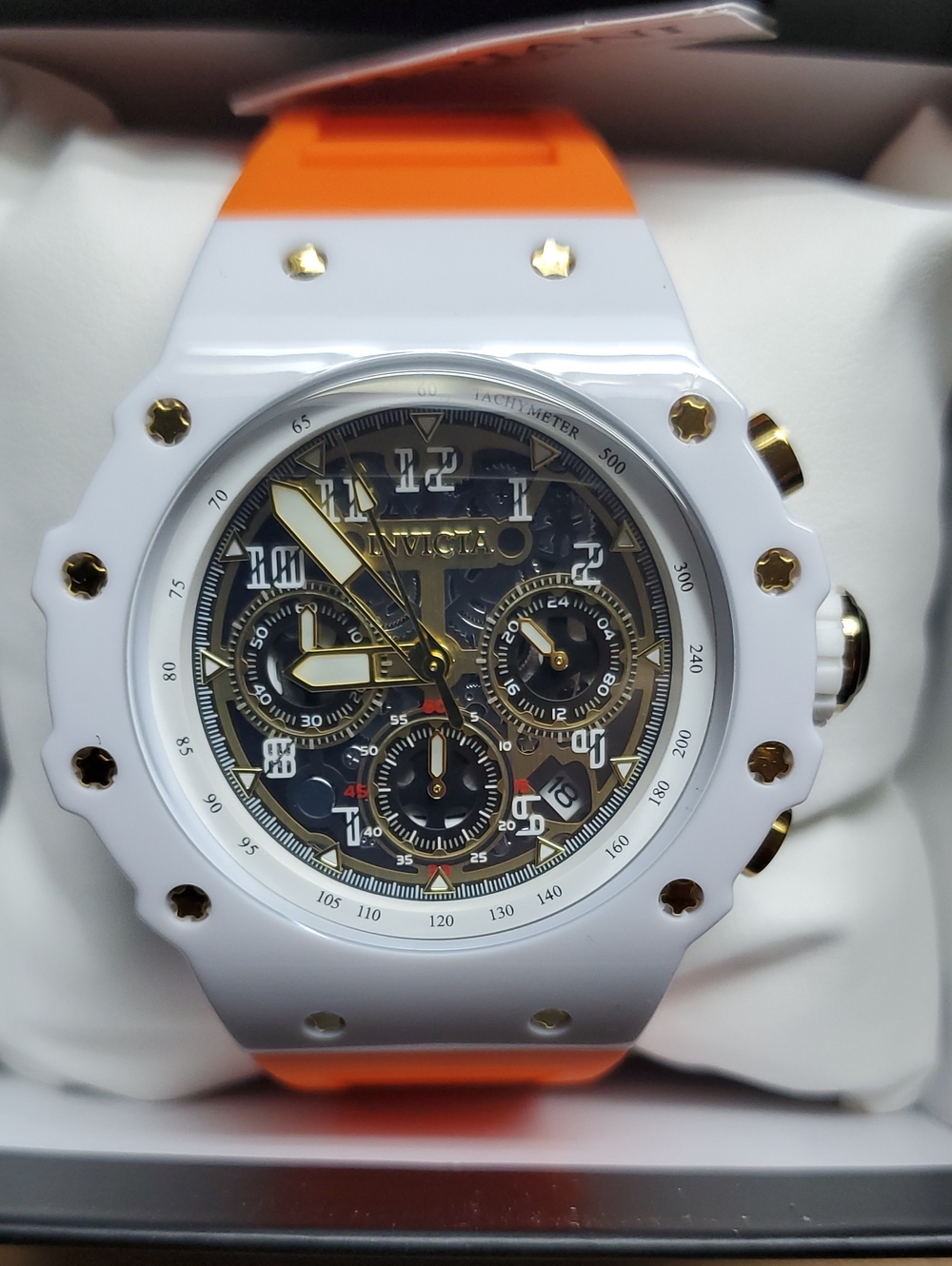 Invicta White and Orange Skeleton Dial Chronograph Watch with Gold Accents